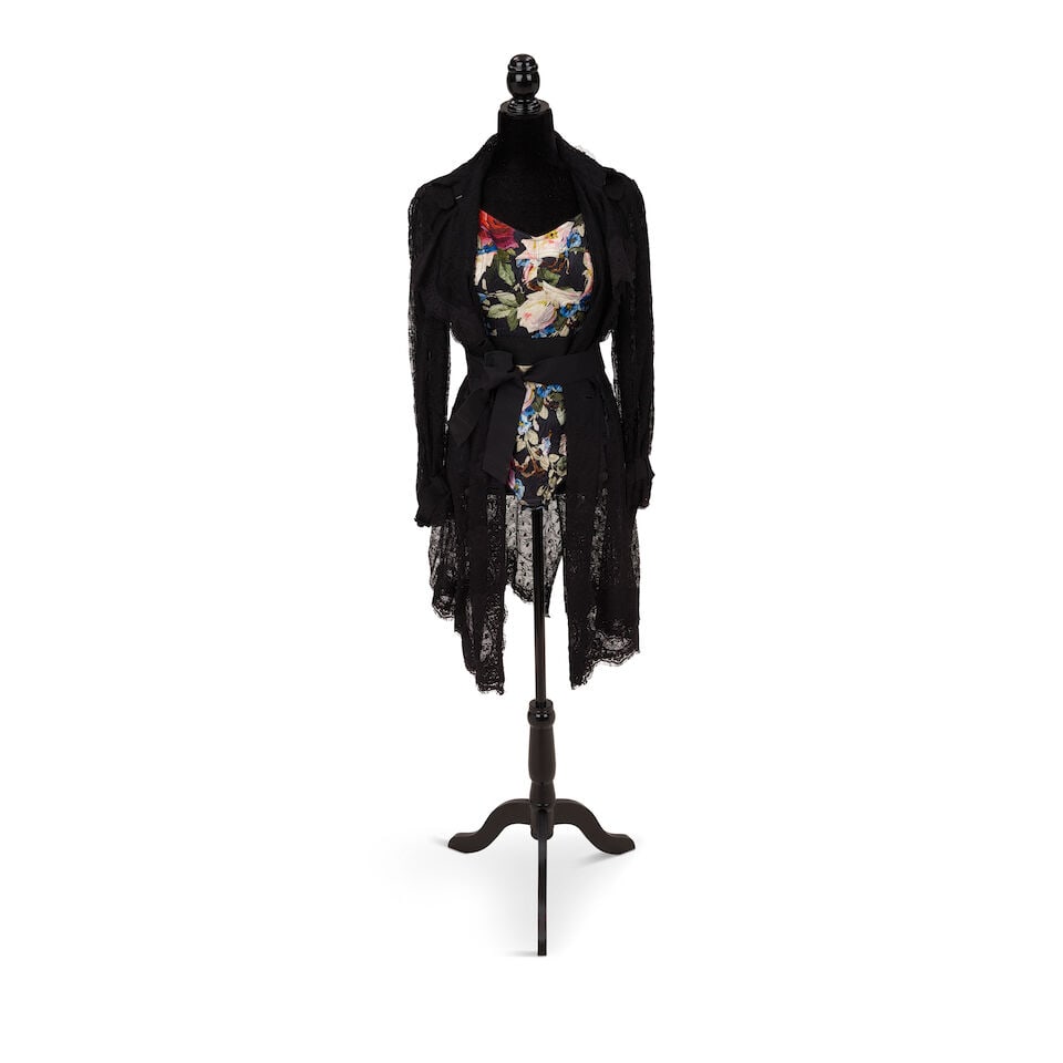 A SCREEN WORN DOLCE & GABBANA TRENCH COAT AND BODY SUIT Domenico Dolce & Stefano Gabbana, Spring...: A SCREEN WORN DOLCE & GABBANA TRENCH COAT AND BODY SUIT Domenico Dolce & Stefano Gabbana, Spring 2010 Comprising a floral and leopard print body suit, 44, and a black lace trench coat, 40, together