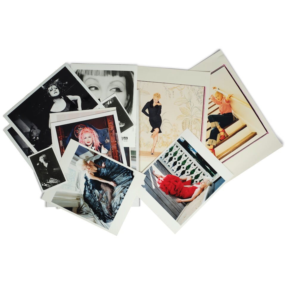 A GROUP OF PHOTOGRAPHS OF CYNDI LAUPER 2000s: A GROUP OF PHOTOGRAPHS OF CYNDI LAUPER 2000s One signed by Maarten 'Kooos' Corbyn (on the verso), two signed by Joanne Toy (on the verso), and two publicity shots by Ellen von Unwerth. (19) sheets