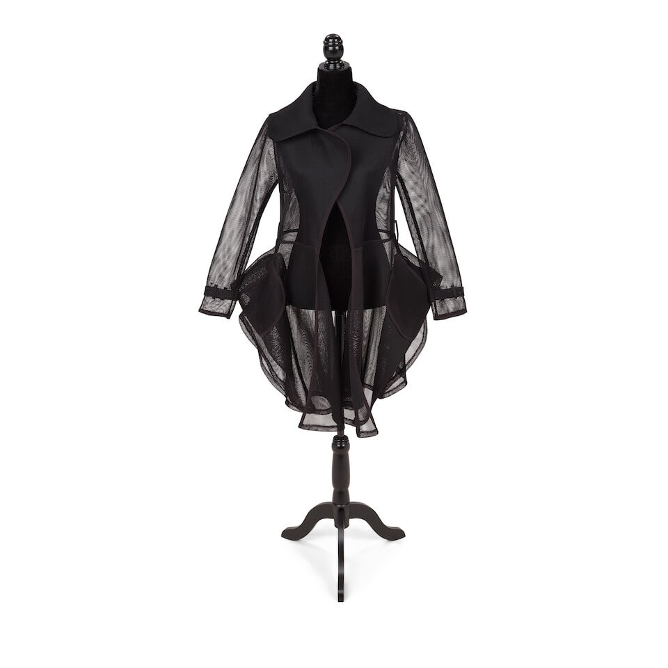 A GROUP OF STATEMENT JACKETS 2010-2018: A GROUP OF STATEMENT JACKETS 2010-2018 Comprising a black lace sleeve open-front jacket, a zipper embellished black coat, a custom Mother of London black leather and red plaid asymmetrical jacket, a