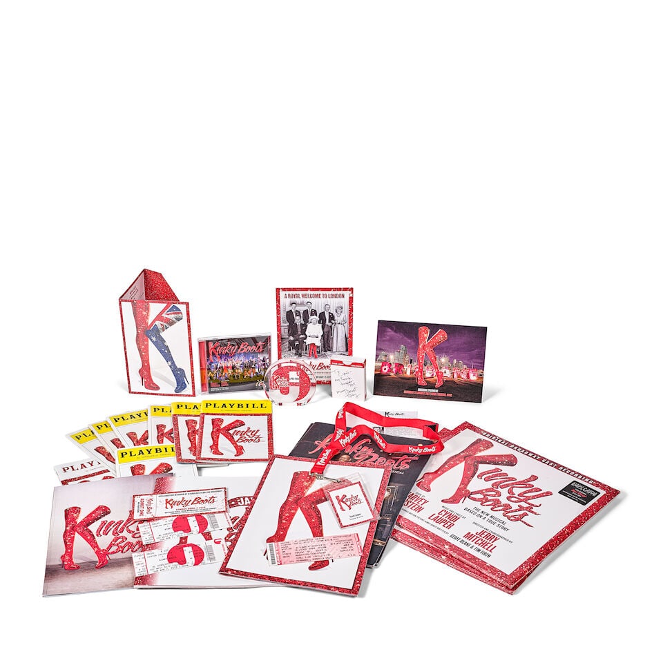 A GROUP OF KINKY BOOTS MATERIAL 2012-2025: A GROUP OF KINKY BOOTS MATERIAL 2012-2025 Including a framed color photograph of Annaleigh Ashford, Billy Porter, and Stark Sands, a framed color photograph of Cyndi Lauper and Harvey Fierstein with t