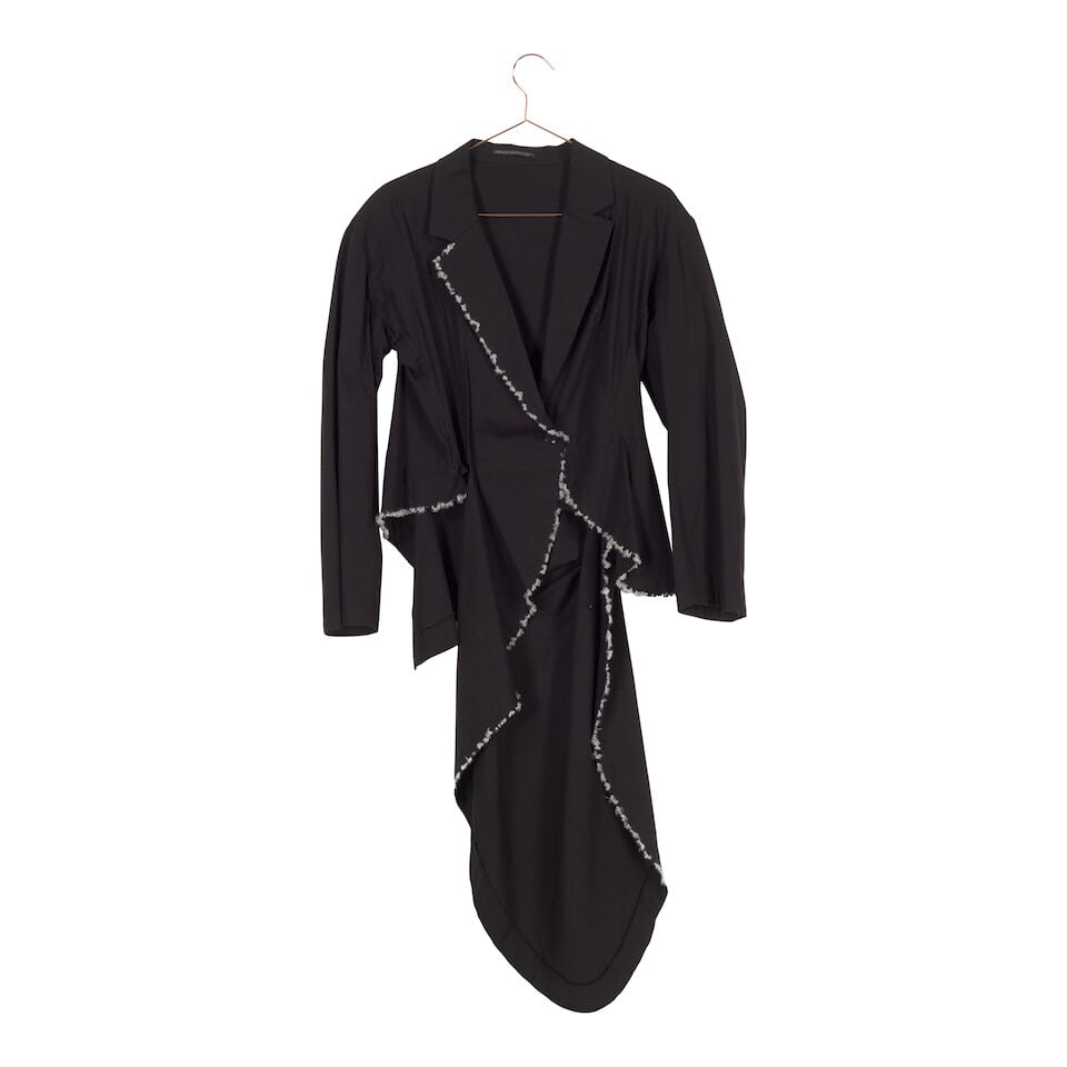 A GROUP OF BLACK AND WHITE CLOTHING WORN TO PUBLIC APPEARANCES 2011 and later: A GROUP OF BLACK AND WHITE CLOTHING WORN TO PUBLIC APPEARANCES 2011 and later Comprising a Maje collared sleeveless top, 3, a hands white button-up blouse, a Yohji Yamamoto black coat with white fuzz