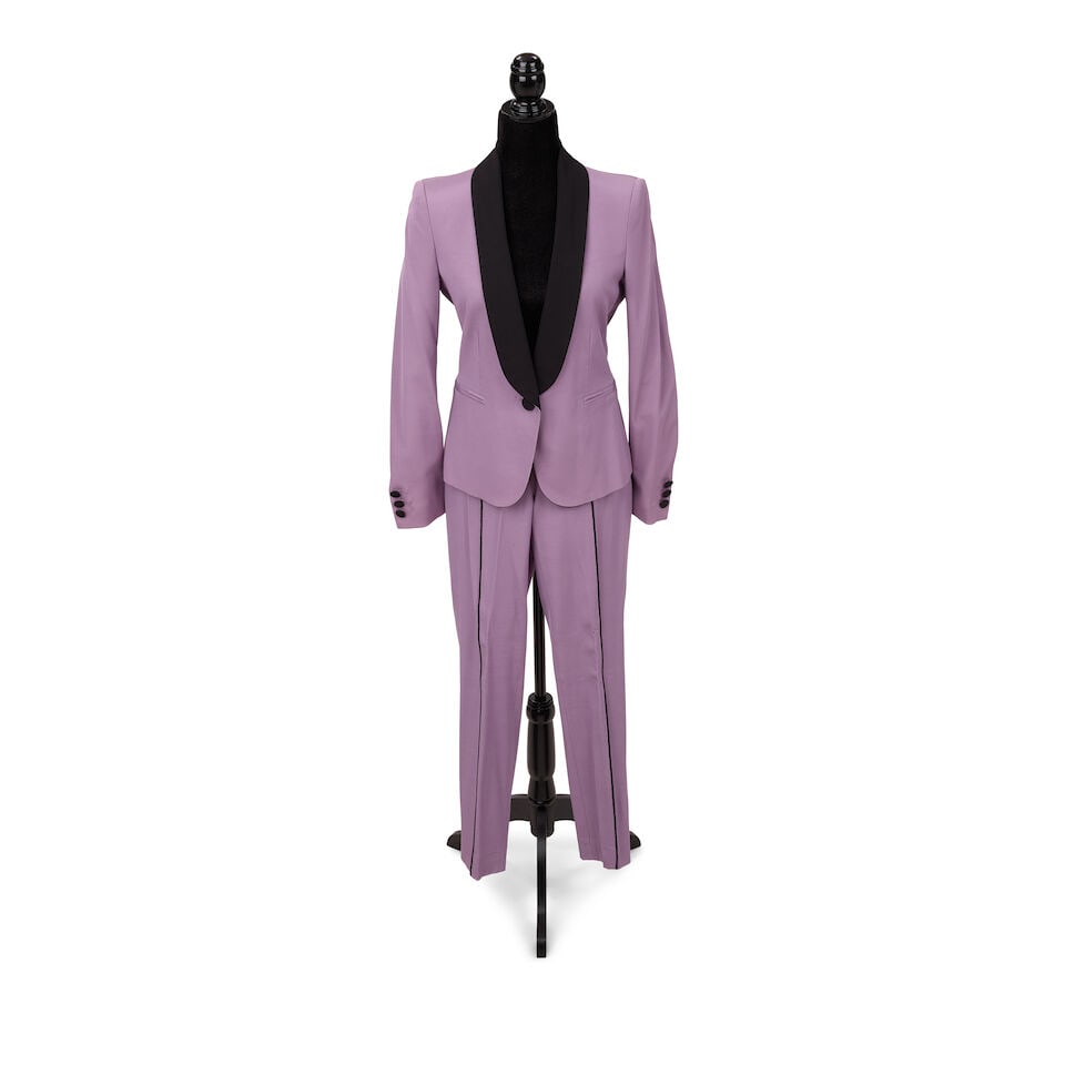 THREE MOSCHINO FORMAL LOOKS 2010s: THREE MOSCHINO FORMAL LOOKS 2010s Comprising a Cheap & Chic black lilac pant suit, 8, a black double-breasted blazer dress, and a Cheap & Chic black dress with gold hardware, 8. (4) Footnotes: The bla