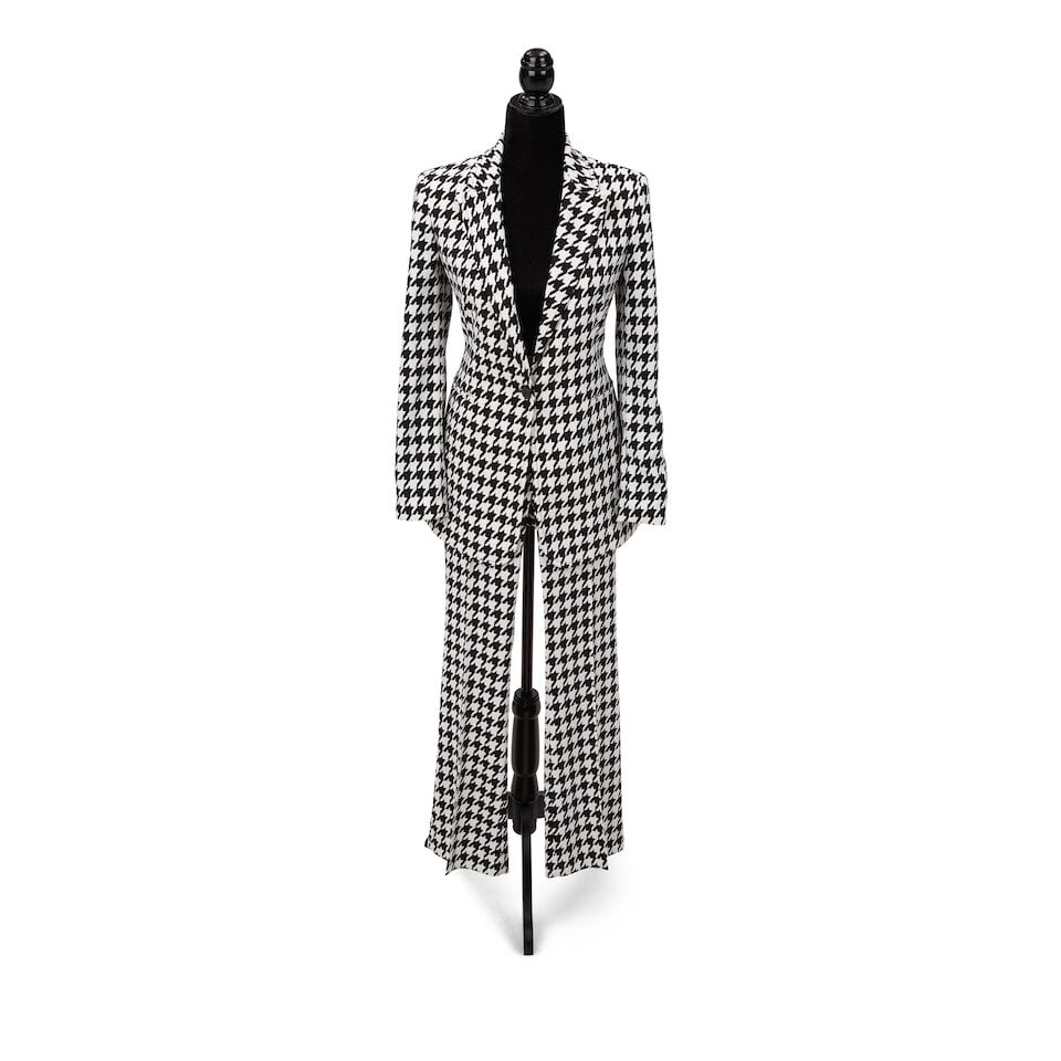 A GROUP OF LOOKS FROM KINKY BOOTS EVENTS 2016-2022: A GROUP OF LOOKS FROM KINKY BOOTS EVENTS 2016-2022 Comprising a Zara silver metallic dress and Demi Choonmoo Park black blazer, a black belted dress, and an Alice + Olivia black and white houndstooth 