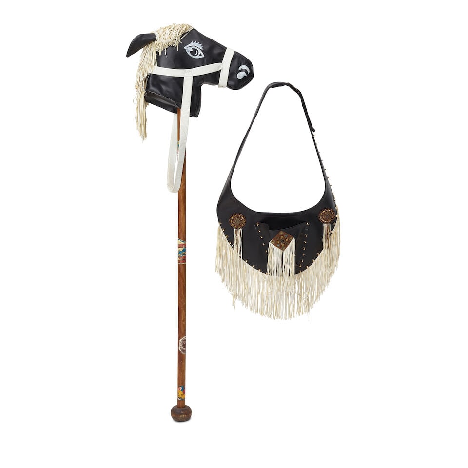 A STAGE-USED HANDMADE BLACK AND WHITE LEATHER HOBBY HORSE (1 of 2)