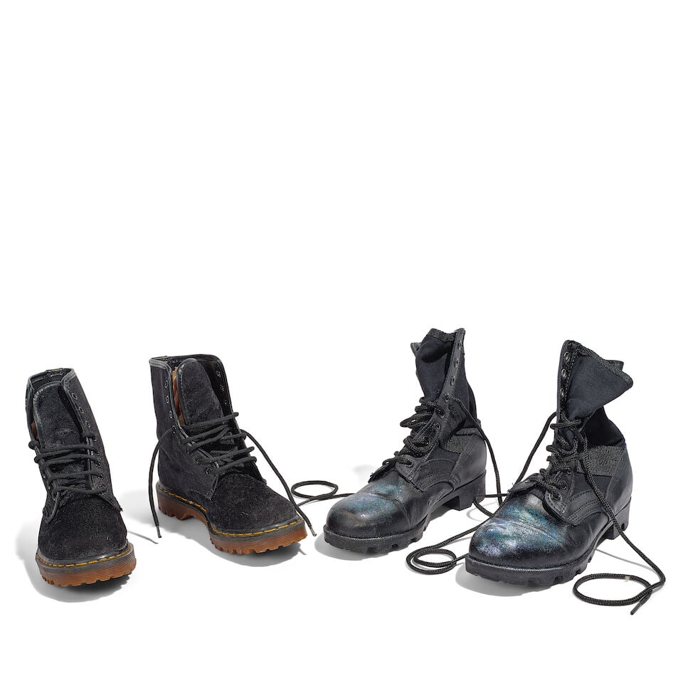 TWO PAIRS OF STAGE-WORN BLACK BOOTS: TWO PAIRS OF STAGE-WORN BLACK BOOTS Comprising a pair of Capezio combat boots, 10M, and a pair of Vulcan black cap toe ankle boots. This lot is subject to the following lot symbols: ¤ ¤ Unle