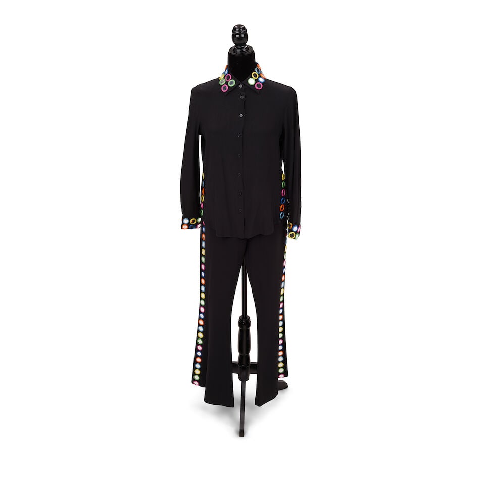 A MOSCHINO COUTURE! BLACK MIRROR APPLIQUE PANT SUIT Jeremy Scott, Resort 2017, the pants Look 45: A MOSCHINO COUTURE! BLACK MIRROR APPLIQUE PANT SUIT Jeremy Scott, Resort 2017, the pants Look 45 Acetate blend, French size 40. Footnotes: Worn onstage during the 2017 North American Tour at Northwell