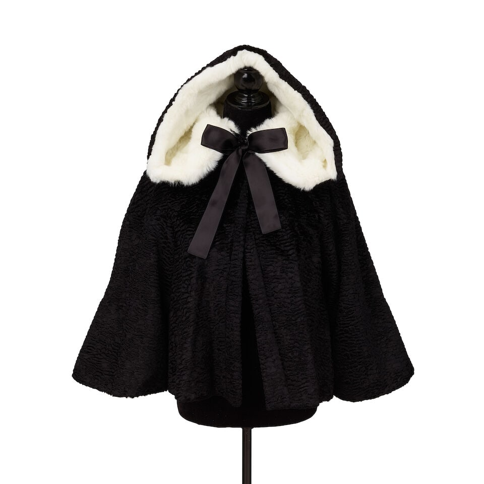 A GROUP OF HOLIDAY LOOKS FEATURING AN ALEXANDER MCQUEEN CAPE 2010s-2020s (1 of 7)