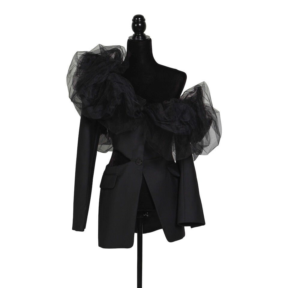 TWO ALEXANDER MCQUEEN BLACK JACKETS Sarah Burton, Fall 2022 & 2023: TWO ALEXANDER MCQUEEN BLACK JACKETS Sarah Burton, Fall 2022 & 2023 Comprising a 2022 tulle shoulder jacket, 44, and a 2023 black leather biker vest, 44. Footnotes: The tulle jacket Look 40 on the