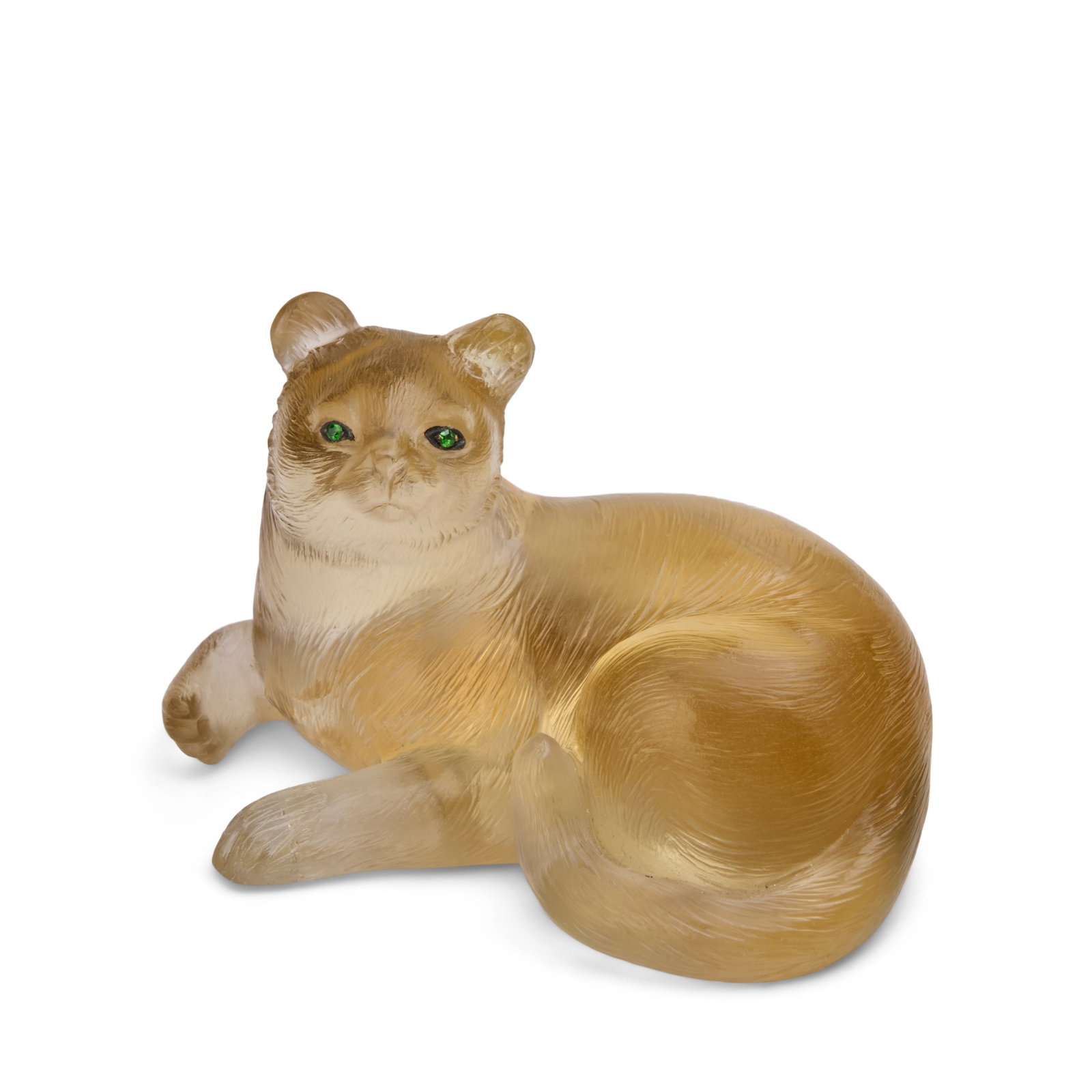 Fabergé: A Hardstone Model of a Recumbent Cat St. Petersburg, circa 1900: Fabergé: A Hardstone Model of a Recumbent Cat St. Petersburg, circa 1900 Modeled out of citrine, the eyes set with demantoid garnet, scratched inventory number 7232 (to underside). height 1 1/2 i