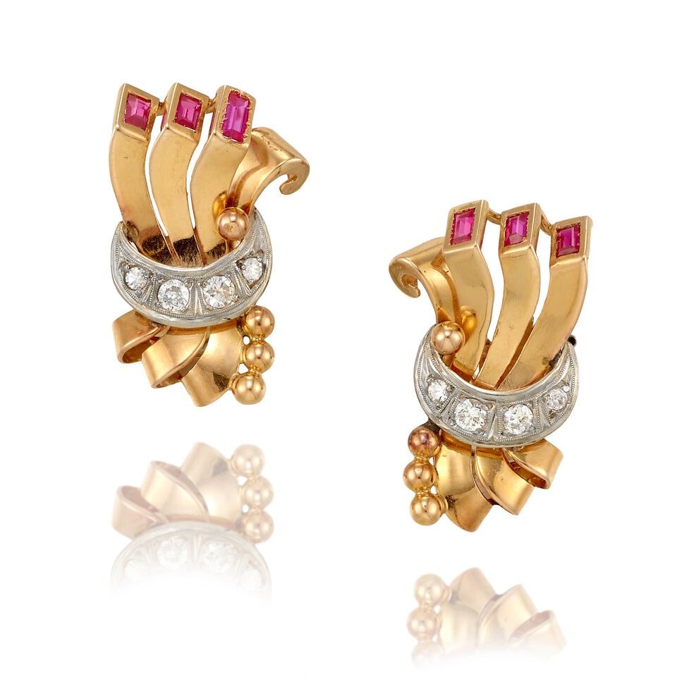 A PAIR OF DIAMOND AND SYNTHETIC RUBY EARRINGS, CIRCA 1940: A PAIR OF DIAMOND AND SYNTHETIC RUBY EARRINGS, CIRCA 1940 • Palladium topped 18K rose gold • Eight round shaped diamonds weighing approximately 0.70 carat total • Six synthetic