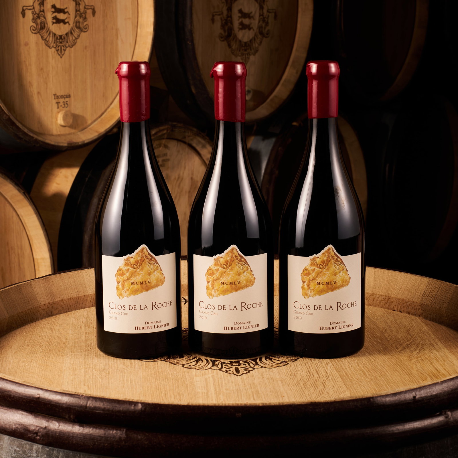 Domaine Hubert Lignier, Clos de la Roche Grand Cru, MCMLV, 2019 (3 x 750ml) and an Annual Alloca...: Domaine Hubert Lignier, Clos de la Roche Grand Cru, MCMLV, 2019 (3 x 750ml) Region: Burgundy Fill Level: excellent Capsule: ok Cork: ok Label: excellent appearance Packaging: 3x original wooden cases 