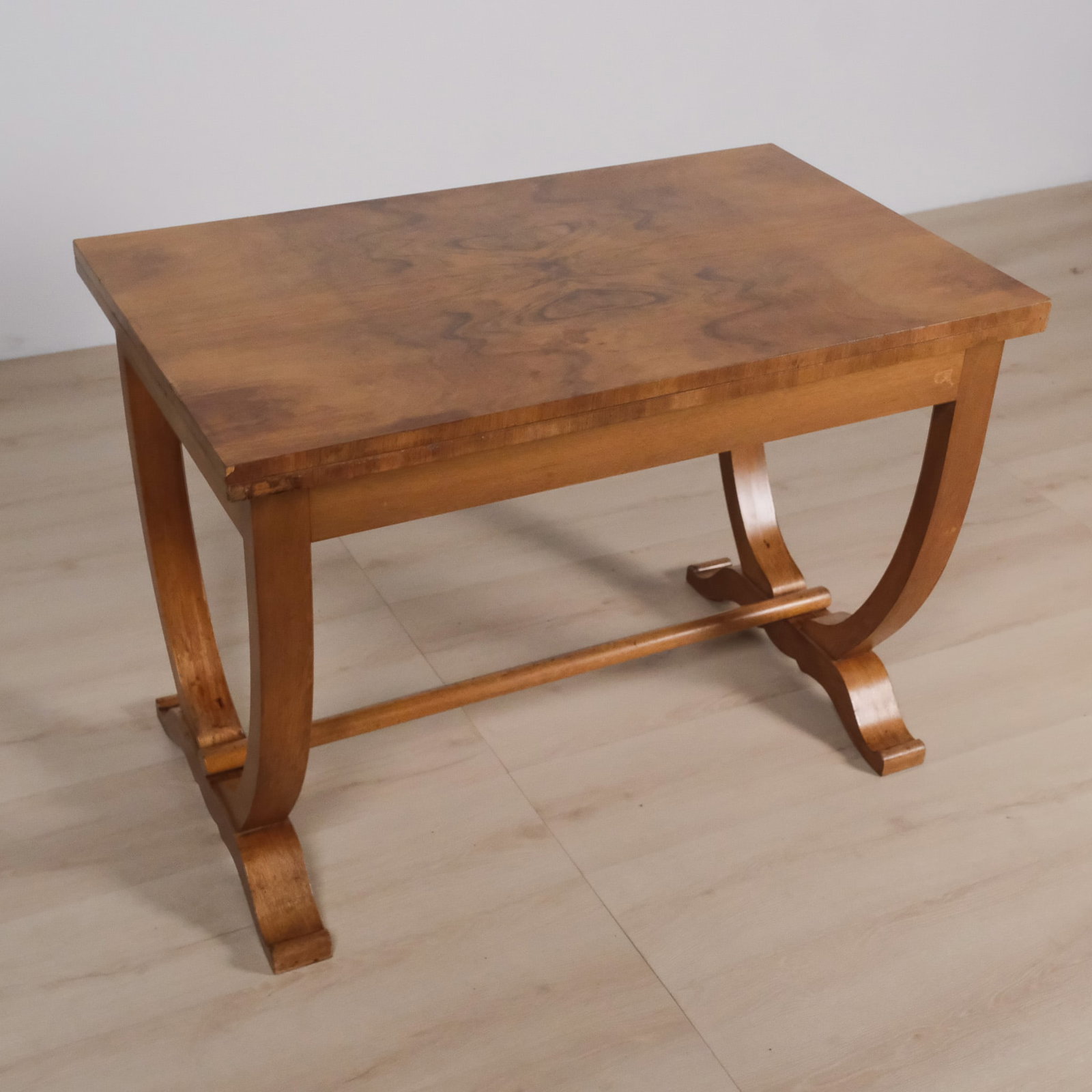 French Art Deco Walnut Flip-Top Table, c. Early to Mid 20th Century: French Art Deco walnut flip-top table, dating from the early-to-mid 20th century. Features a warm honey-toned finish with expressive grain across the top, a molded edge, and an understated grain.