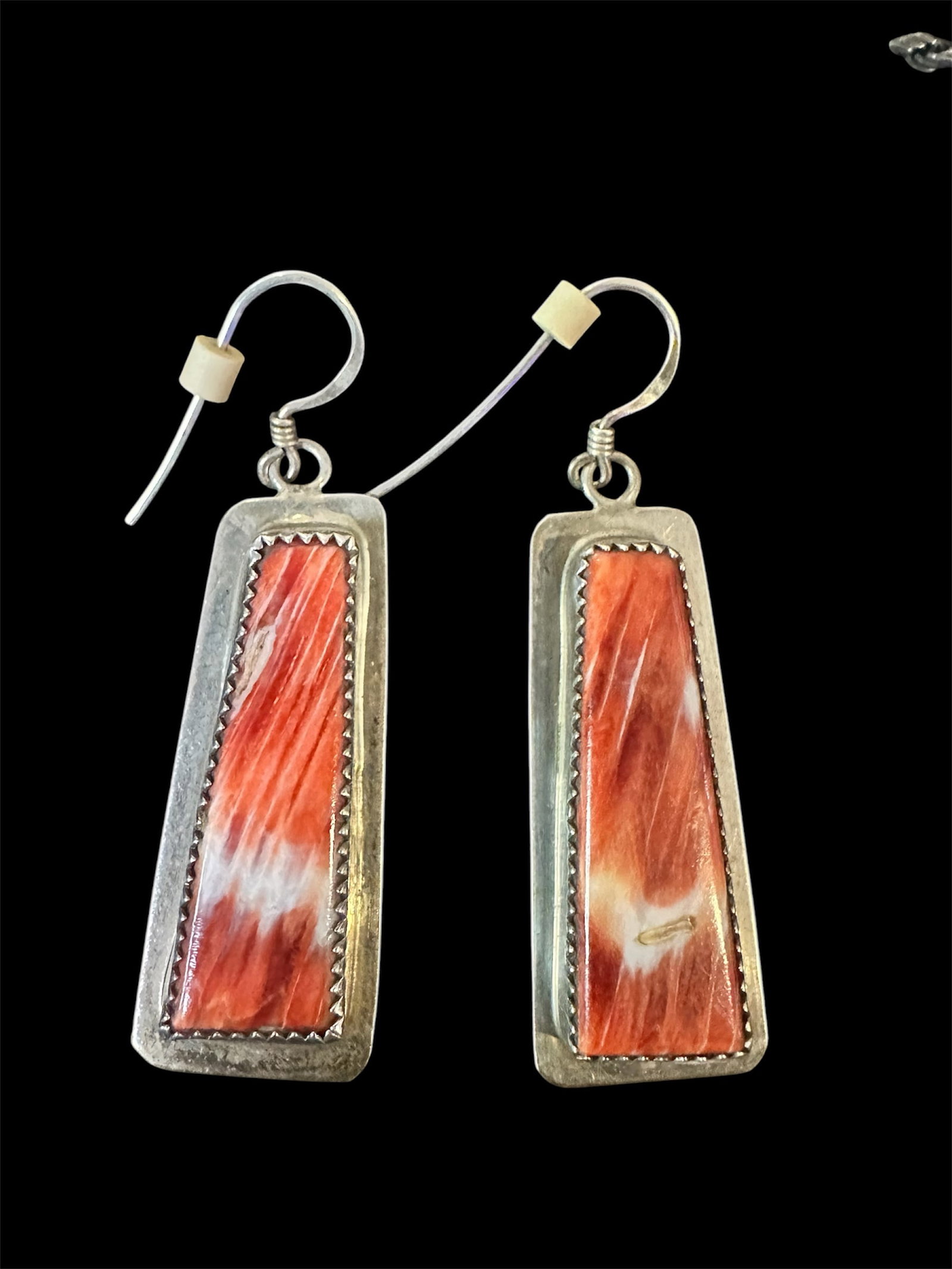 Sterling Silver earrings w/Oyster Shell: Sterling silver earrings with spiny oyster shell inlay and serrated bezel.