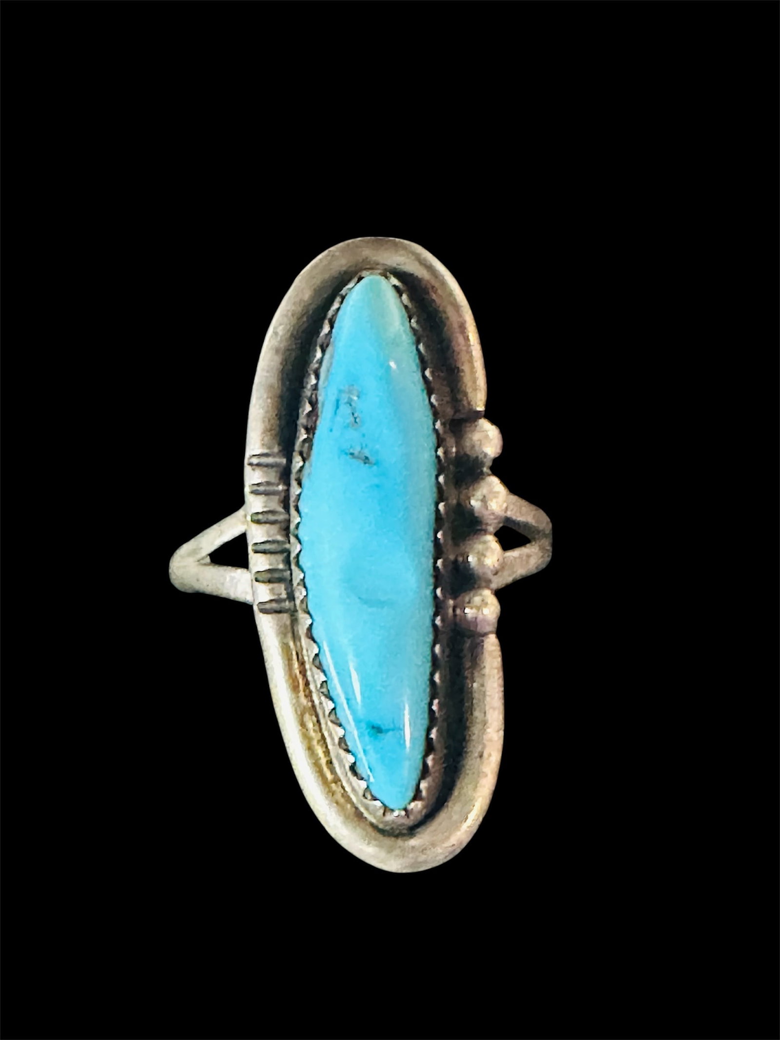 Elongated Sterling Silver Ring: Timex quartz watch with a sterling silver Native American inlay band.