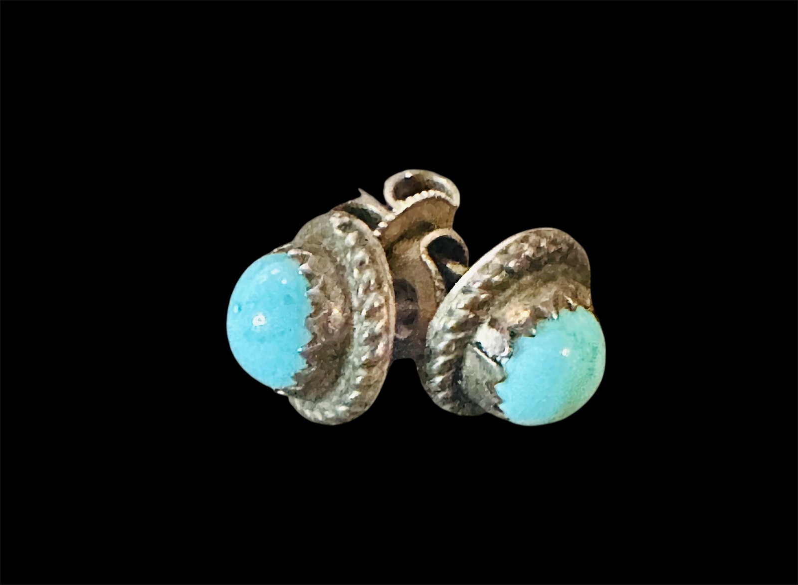 Sterling Silver Stud Earrings: Navajo sterling silver stud earrings with natural turquoise.