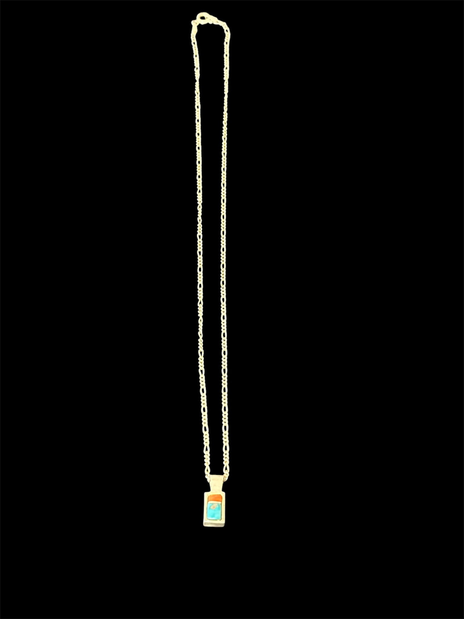 Pendant necklace with turquoise and orange stone: Gold-tone pendant necklace with turquoise and orange stone inlay.6 grams