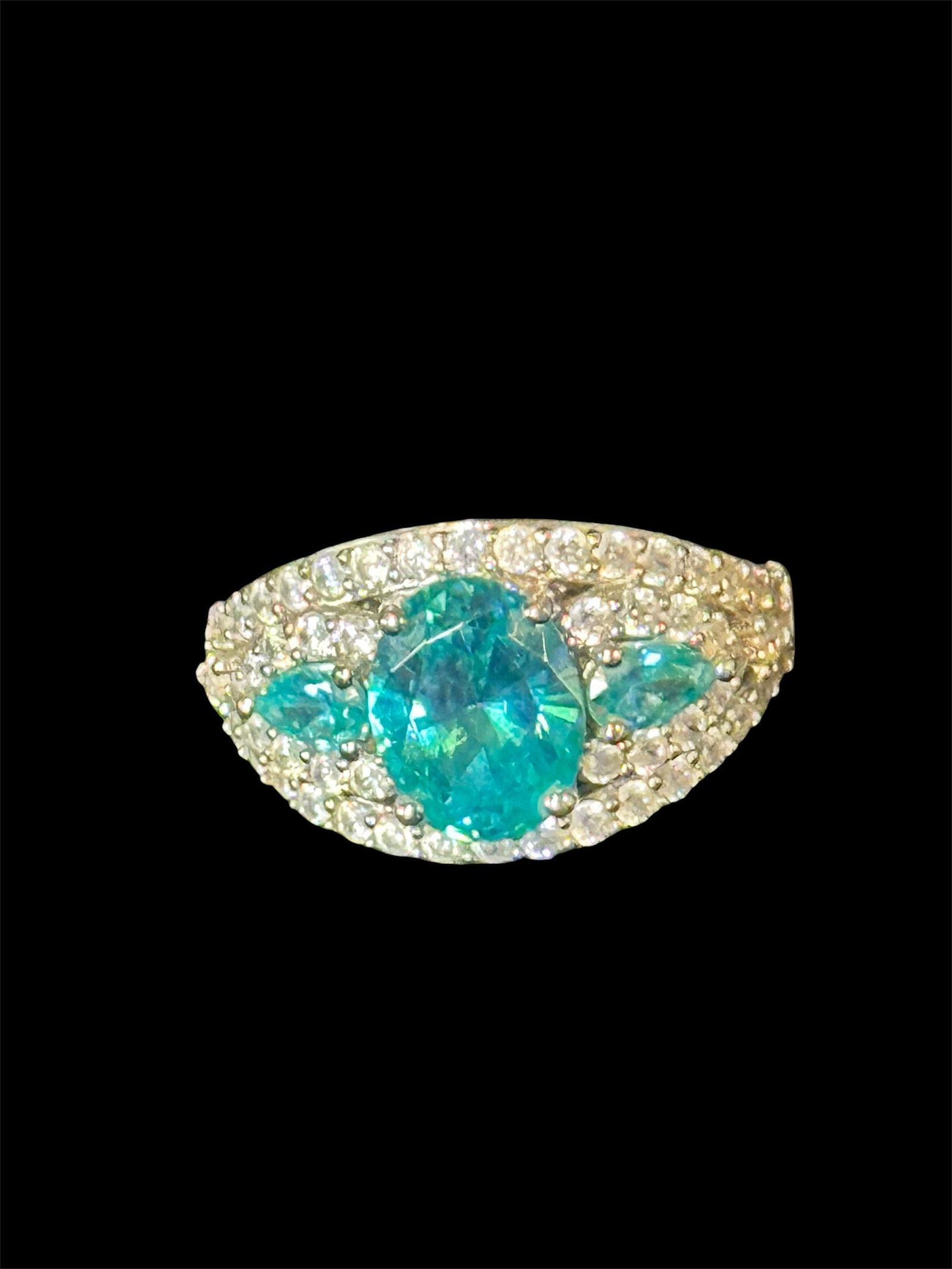 Sterling Silver ring w/blue-green gemstones: Sterling silver ring with simulated blue-green gemstones and cubic zirconia.