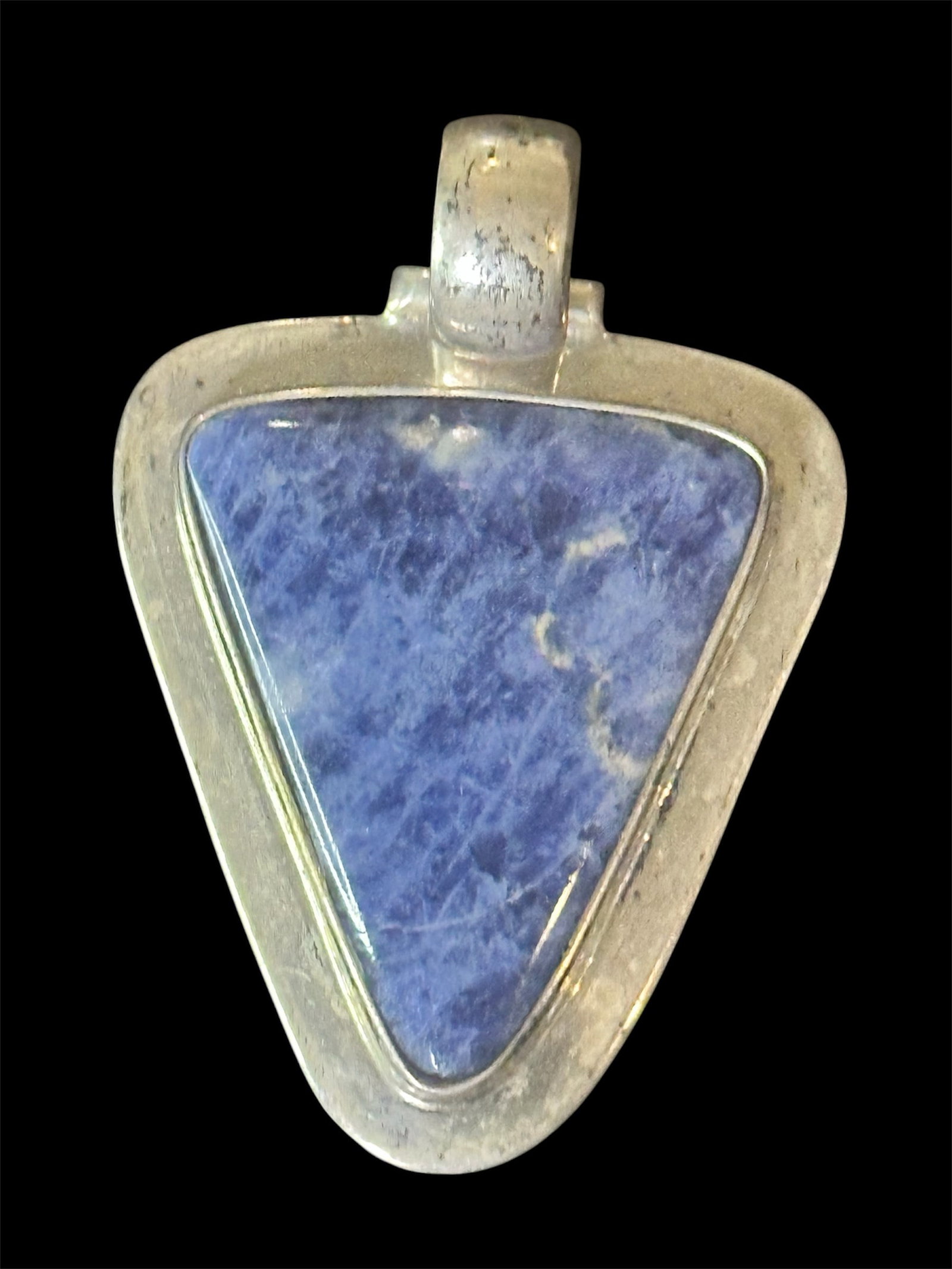 Vintage Triangular Pendant: Vintage triangular sodalite pendant in a Sterling silver setting.