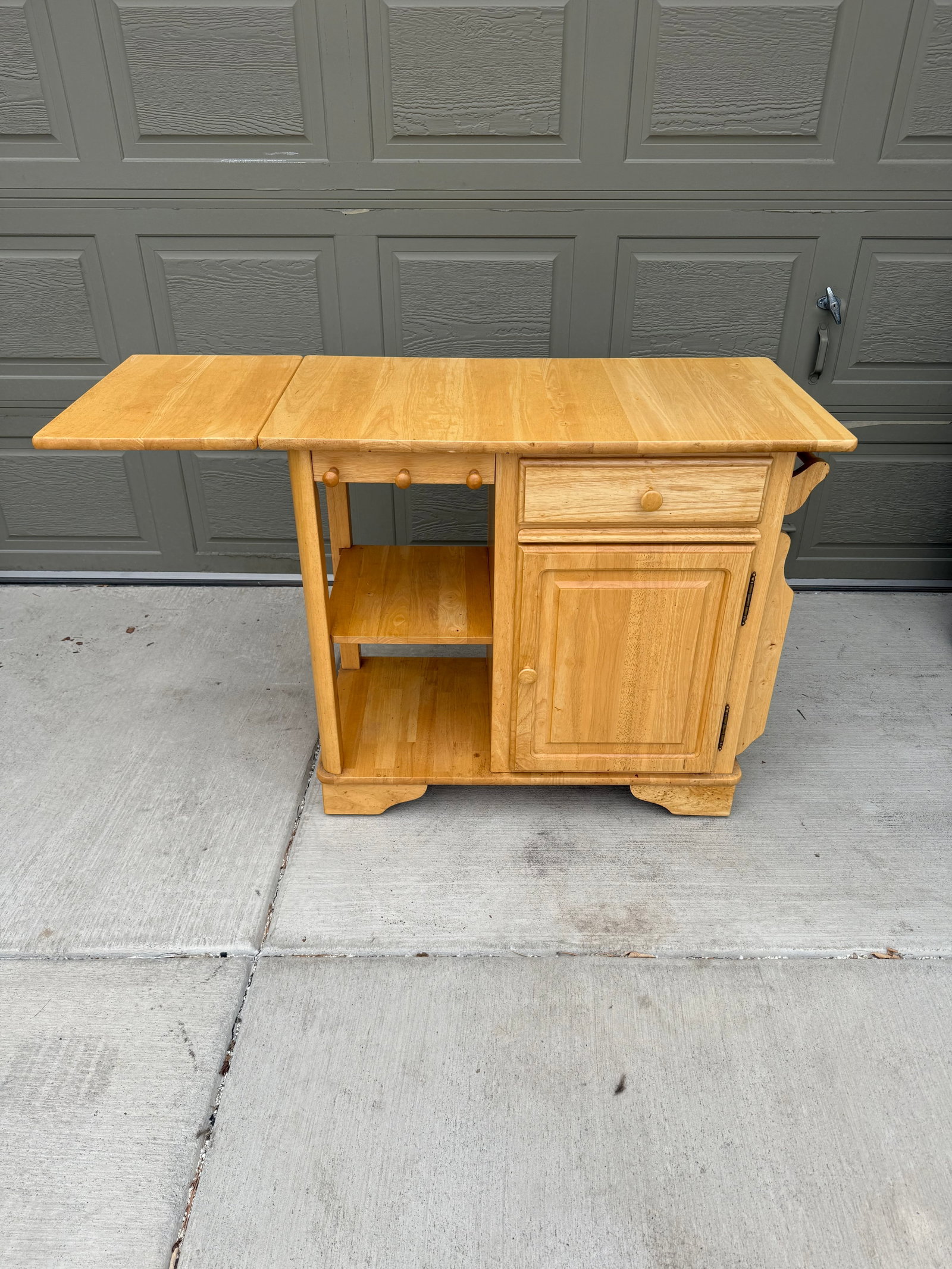 Rolling Kitchen Island: blonde wood with drawers, towel bars, leaf.