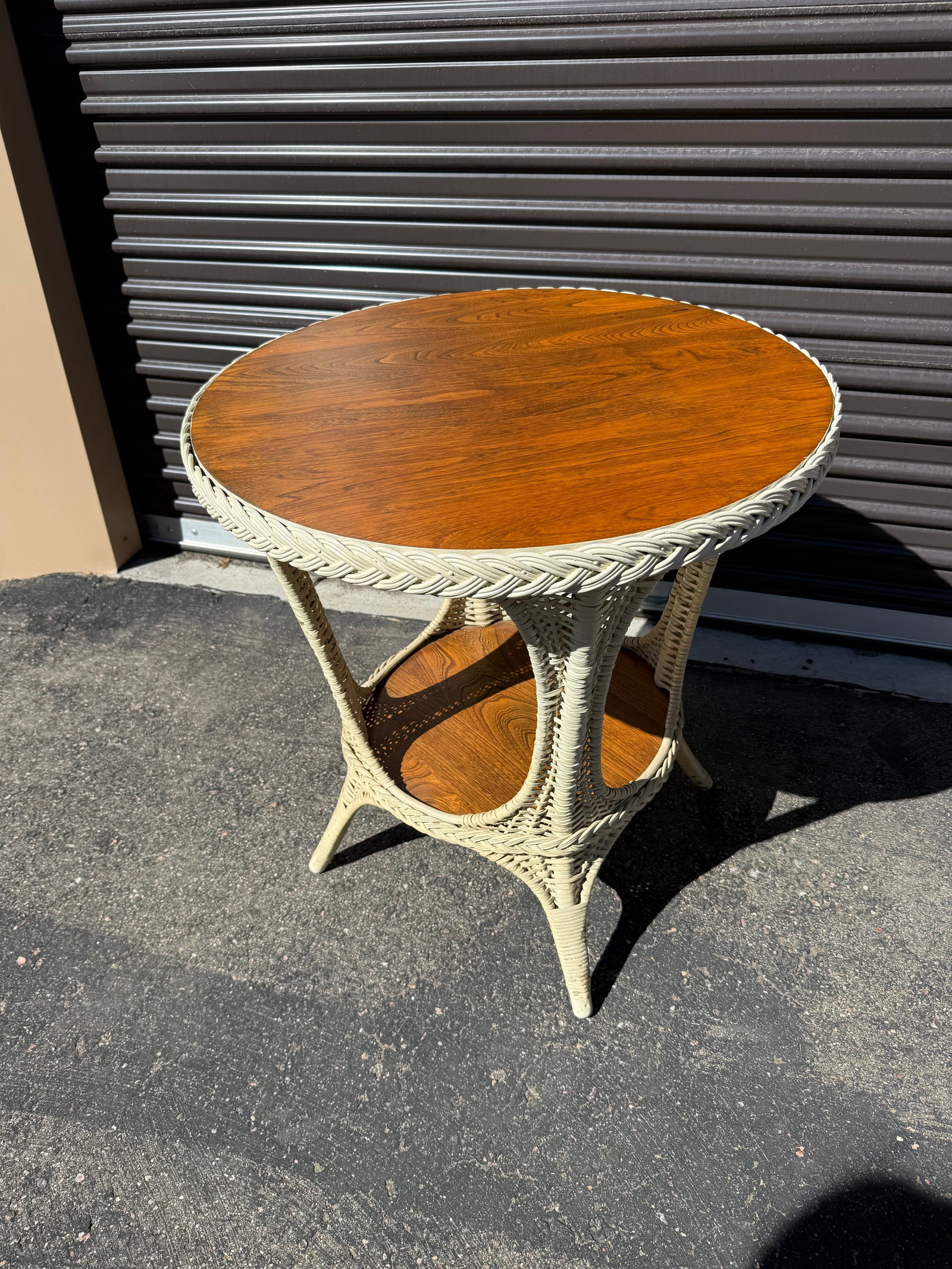 Wicker Table and Chair: With matching table cloth. Dimensions: Table- 30in H x 28in Dia. Chair- 39in H x 29in W x 21in D.