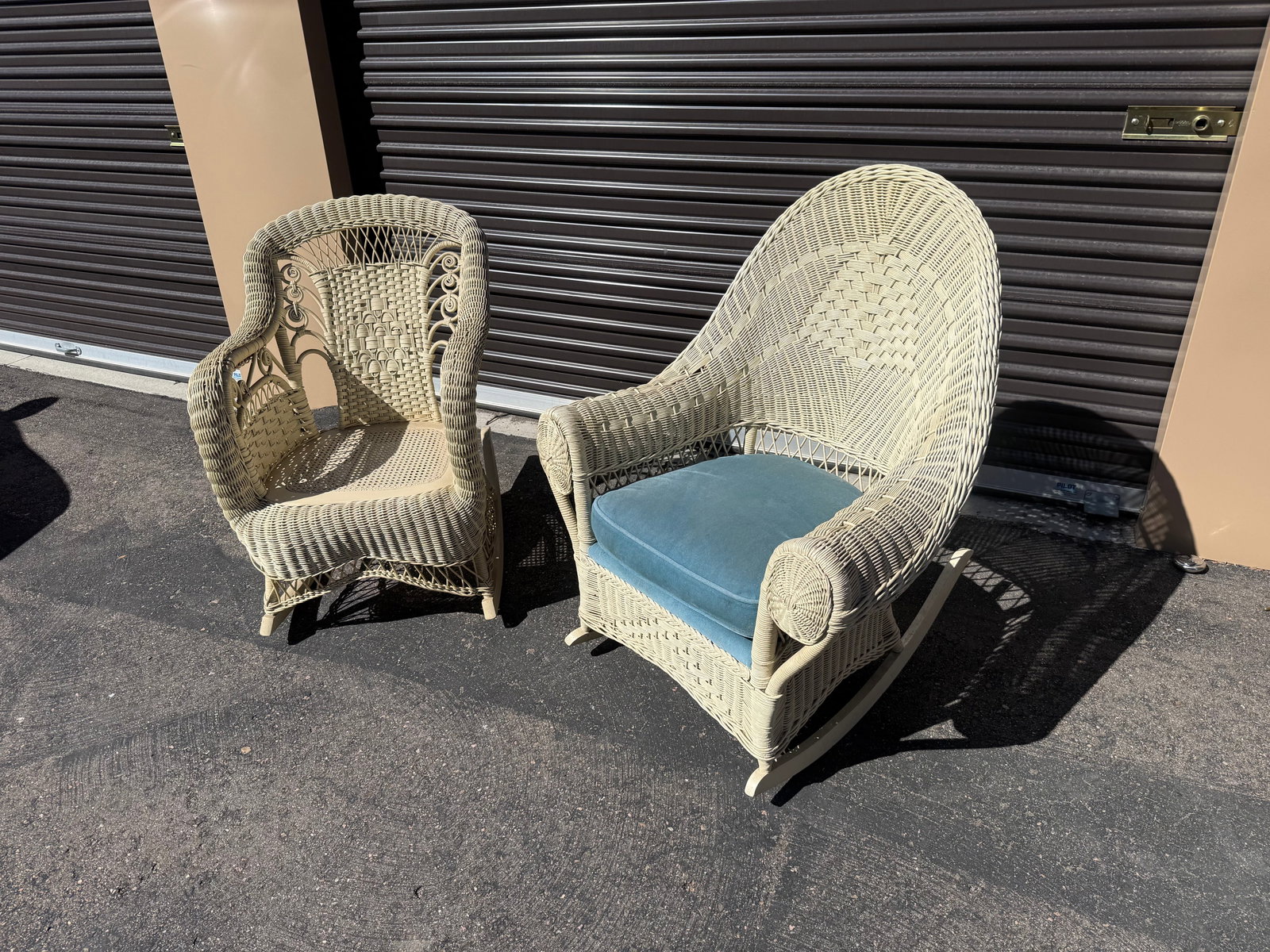 2 Wicker Rockers: One unmarked, one marked Heywood Wakefield. Dimensions: Unmarked- 39in W x 20in D.