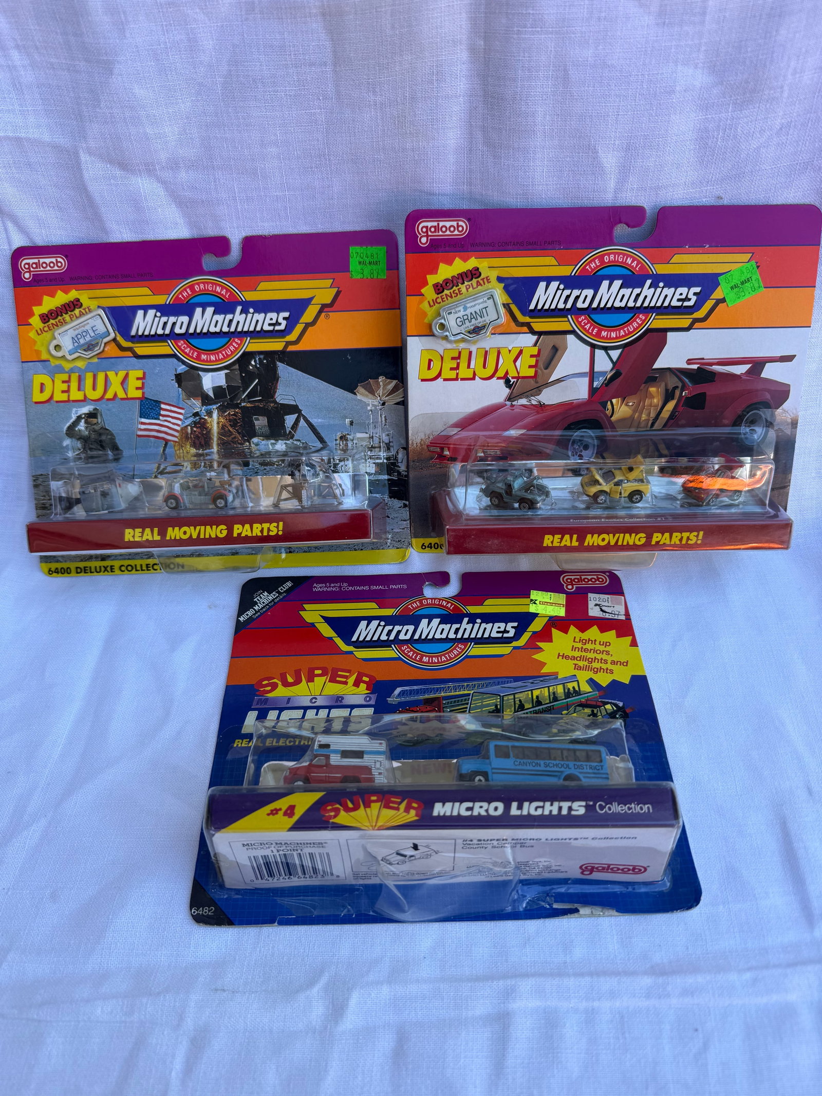 Micro Machines Deluxe and Super Lights Lot: 3 pieces. New in box.