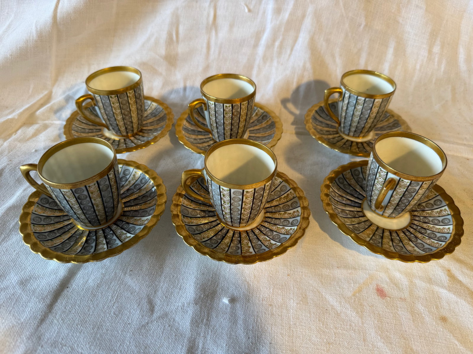 Wurttemberg Demitasse Set: Set of 6. No chips or cracks. Dimensions: 2.5in H x 4.5in W.