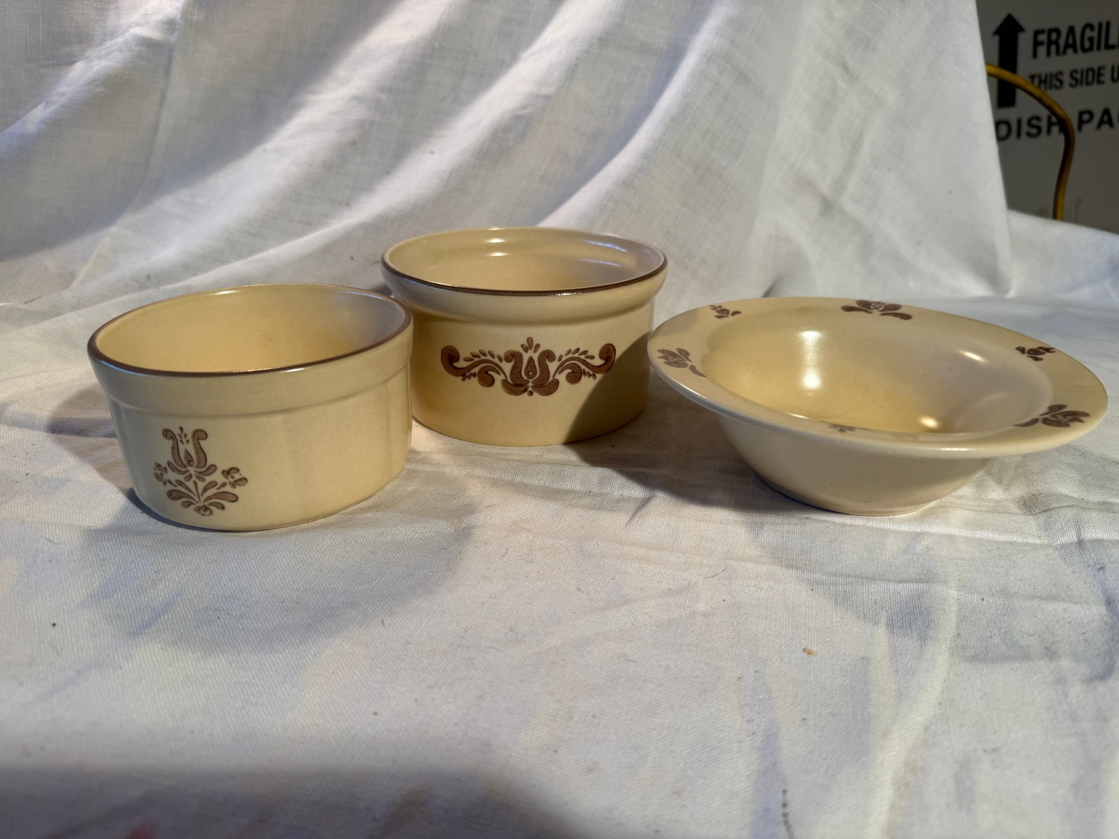 Pfaltzgraff Assorted Bowls: Butter: 2.75in x 5.25in. Small: 2.5in x 4in. Larger: 2in x 6.5in.