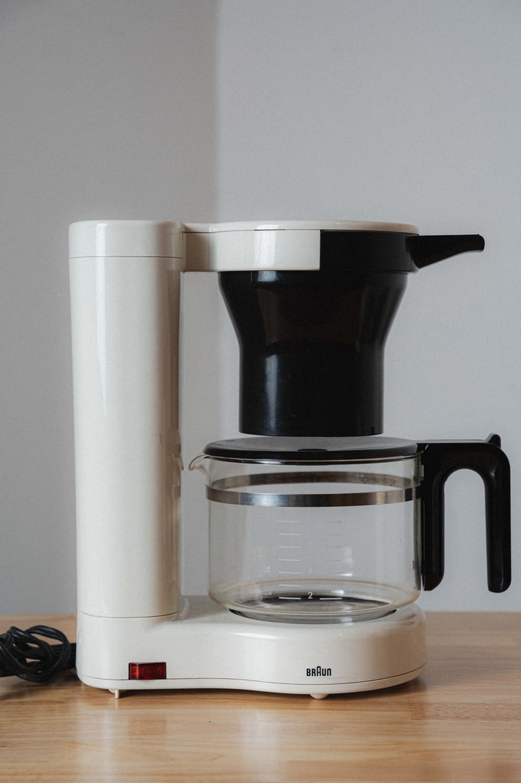 Dieter Rams KF35 Coffee Maker for Braun: Introducing the KF35 Coffee Maker, designed by Dieter Rams for Braun—a hallmark of functionalist German design. With its clean lines, minimalist form, and intuitive operation, this coffee maker exem