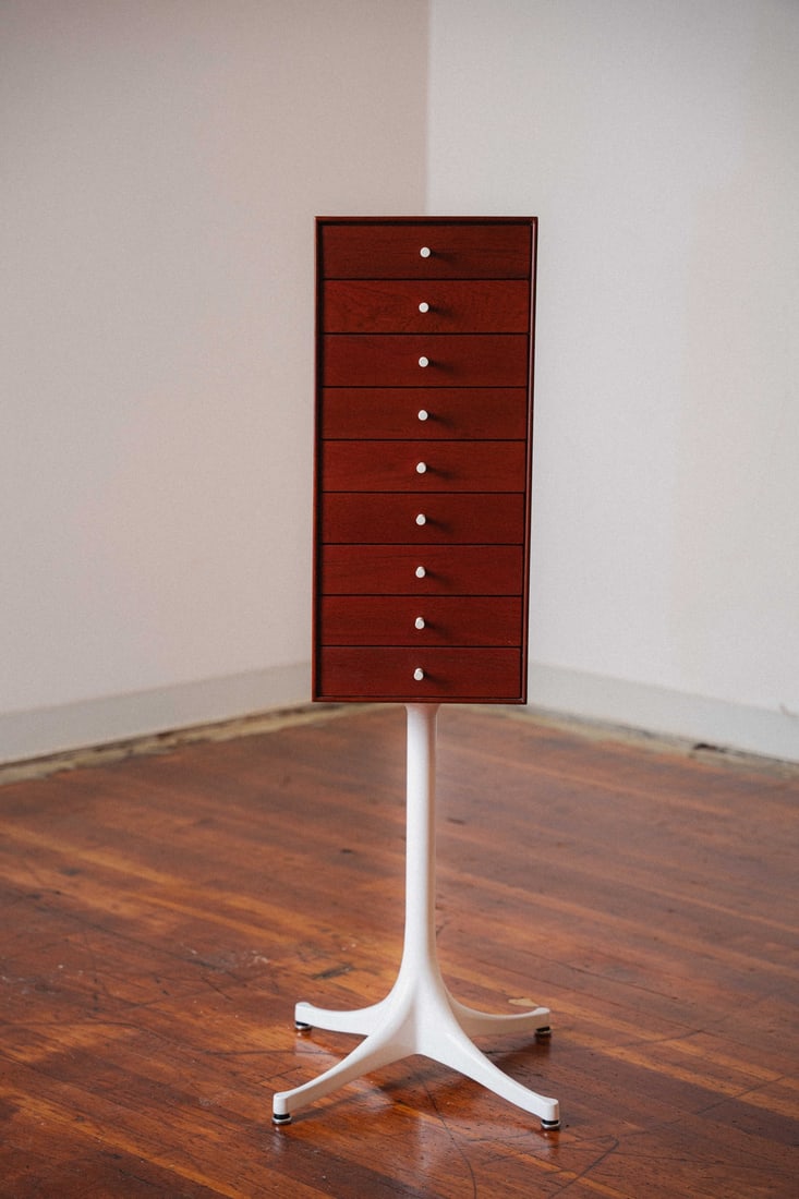 George Nelson Miniature Cabinet for Herman Miller, Rosewood Stained Teak: Introducing the Miniature Cabinet designed by George Nelson for Herman Miller, an iconic piece that reflects mid-century modern ingenuity and playful design. This cabinet features clean lines, functio