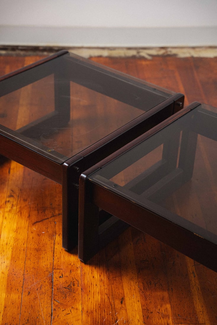 Brutalist Mid-Century Modern Rosewood & Smoked Glass Side Tables by Percival Lafer (set of 2): Introducing a stunning Mid-Century Modern Brutalist End Table featuring a Smoked Glass Top, crafted from rosewood by renowned designer Percival Lafer in Brazil, circa 1970s. These exquisite pieces exe