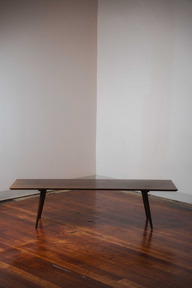 Maple Coffee Table by Paul McCobb for Planner Group: Presenting a maple coffee table designed by Paul McCobb for Planner Group. McCobb was a pivotal figure in mid-century American modern design, celebrated for his clean, functional lines, minimalist aes