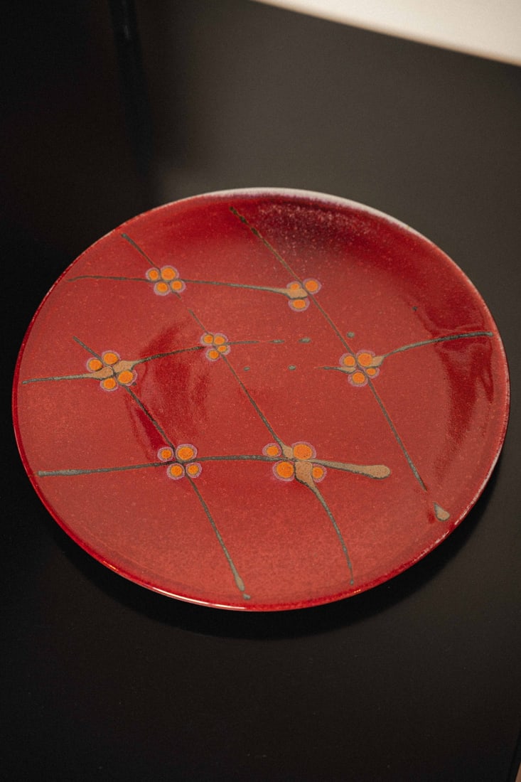 Gerald Newcomb (PNW Artist) Ceramic Plate 15", 1970s: Wheel-thrown studio pottery charger/large plate by Washington-based potter, Gerald Newcomb. This piece features a raised wheat sheaf design. Hand signed 'Newcomb' to the underside.