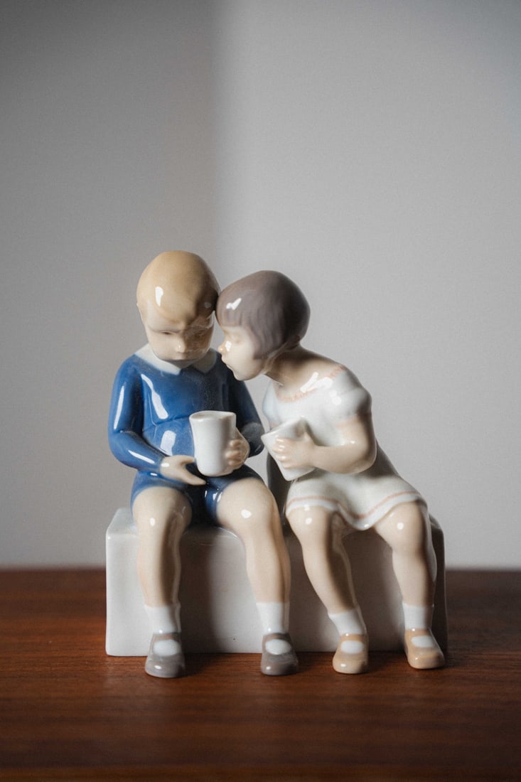 Claire Weiss, Royal Copenhagen Bing & Grondahl Porcelain Figurine #2175: Presenting a porcelain figurine by Bing & Grøndahl, crafted in Denmark. B&G, founded in 1853, is renowned for its high-quality porcelain, delicate modeling, and hand-painted finishes, producing