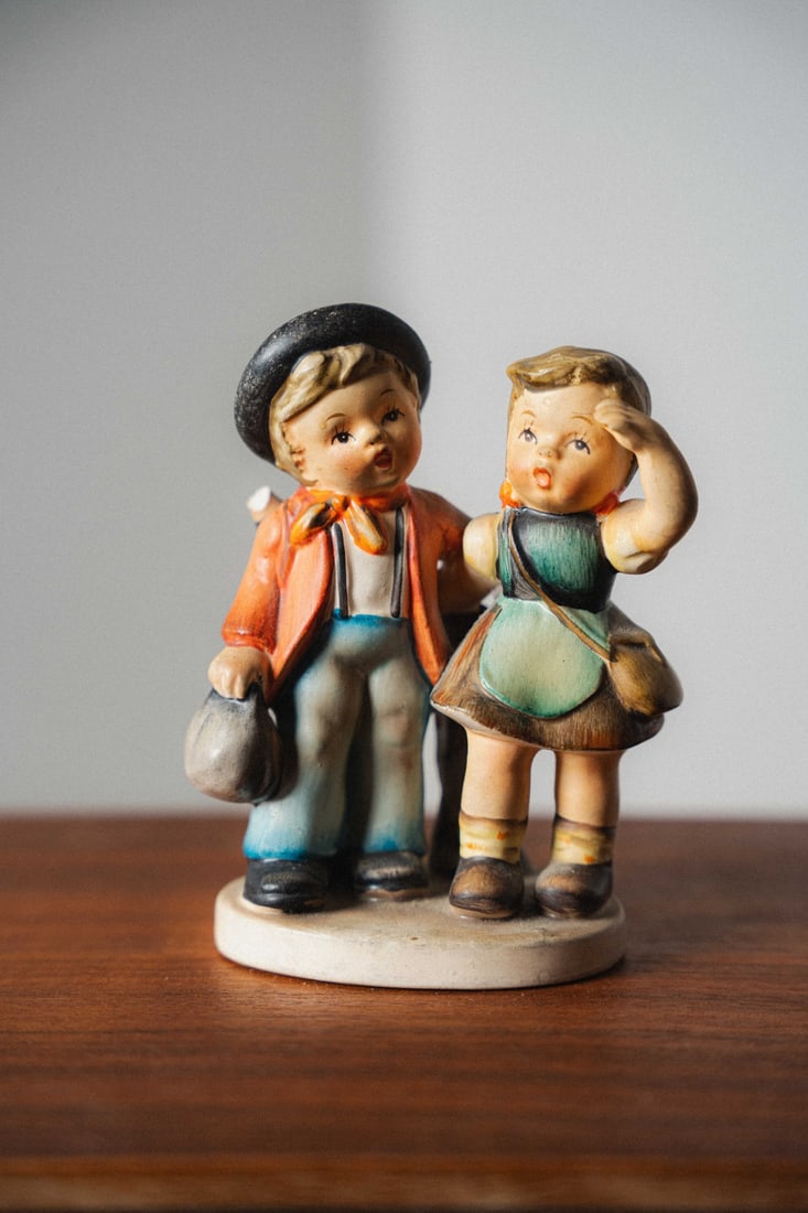 Hummel Max & Moritz Figurine "Picnickers": Presenting a Hummel "Max & Moritz" figurine, modeled after Wilhelm Busch's beloved 19th-century characters, produced by W. Goebel Porzellanfabrik of Germany. Hummel figurines, first introduced in