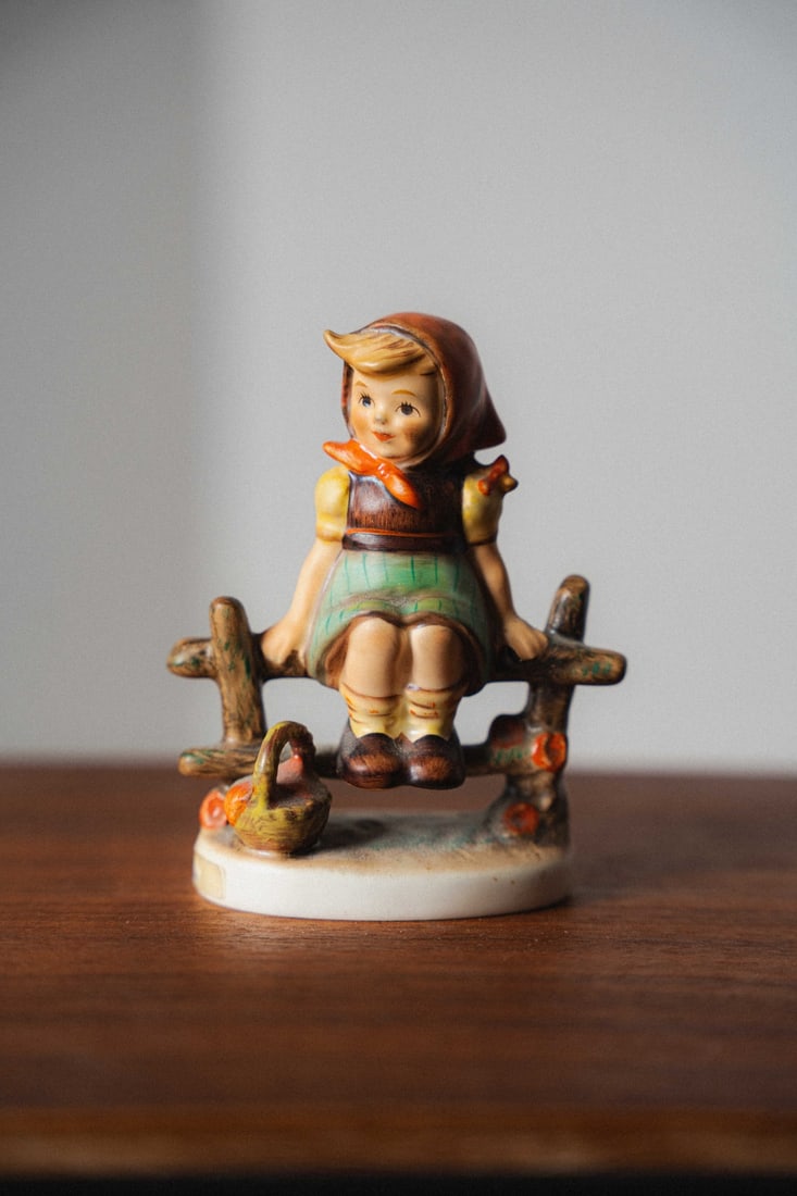 Vintage Hummel Goebel Figurine #112 3/0 'Just Resting' 1938: Presenting a Hummel Goebel figurine #112 3/0, "Just Resting," produced by W. Goebel Porzellanfabrik of Germany with an original copyright date of 1938. This small-sized variant features a young boy