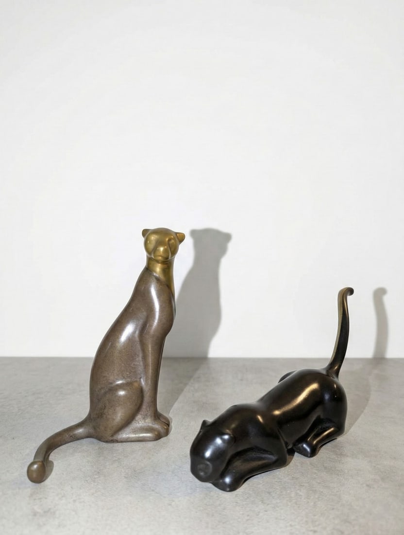 Loet Vanderveen, Dutch 1921-2015, Two Works (sitting cheetah and stalking jaguar): Two Works (Leopards) bronze. Each signed and numbered. The upright cheetah numbered 48/2500, the stalking leopard numbered 44/2500