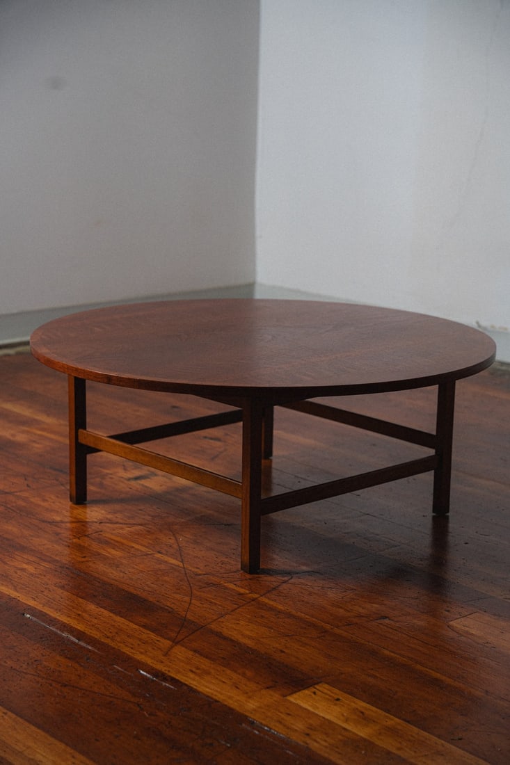 Lane Delineator Walnut Coffee Table by Paul McCobb - Round: Presenting a round Delineator walnut coffee table by Paul McCobb, produced by Lane Furniture, a refined example of mid-century American design by one of the era's most celebrated and prolific