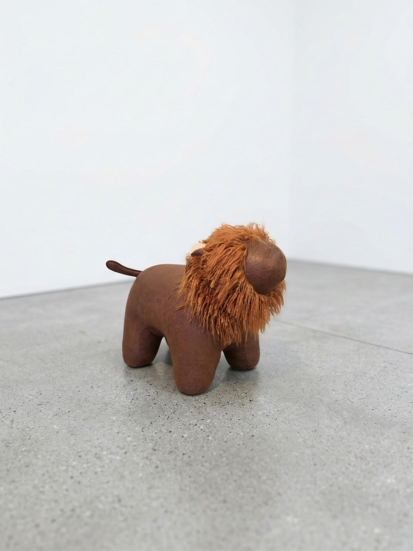 Joshua Steinberg, Classic Safaro Ottoman Series, Proud Lion: A statement piece for the bold. The Classic Safaro Ottoman Series, from Joshua Steinberg is an exclusive piece of statement furniture, designed to make an audacious statement of style and quality. Dim