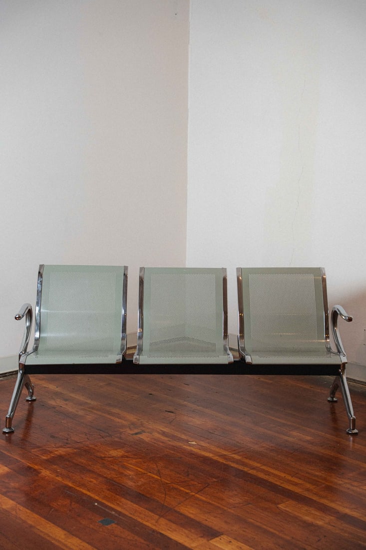 Eames-Style Aluminum Airport Bench Seat: Presenting an Eames-style aluminum airport bench seat, a striking example of the institutional modernist seating typology that flourished in the postwar era as airports, civic buildings, and