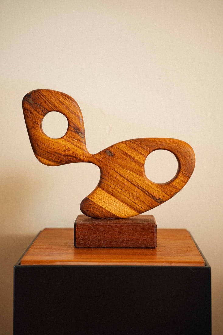 "Two Holes Balancing" Reclaimed Teak Sculpture by Ozzie Uygur: Presenting "Two Holes Balancing," a reclaimed teak sculpture by Ozzie Uygur, a meditative and formally sophisticated work by a contemporary sculptor whose practice engages deeply with the expressive