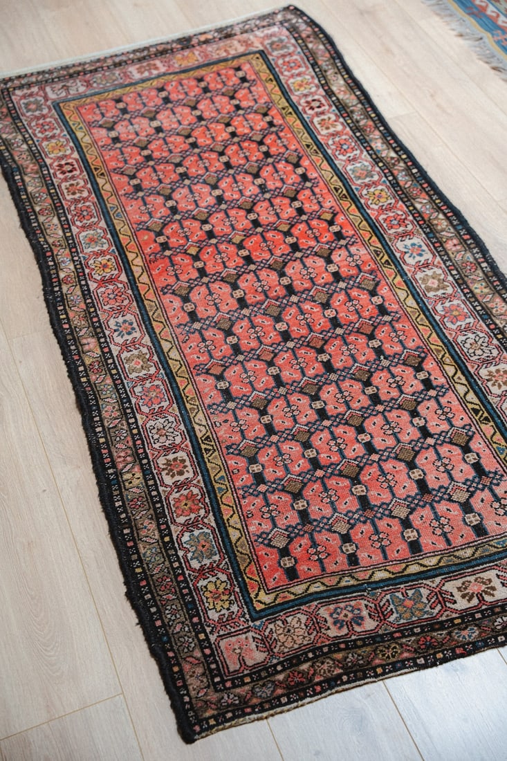 Pink Hamadan Rug ca. 1920s 3’2' x 6’8': Presenting a pink Hamadan rug dating to circa the 1920s, measuring roughly 3' x 7', a charming and characterful example from one of Persia's most prolific and historically significant weaving regions