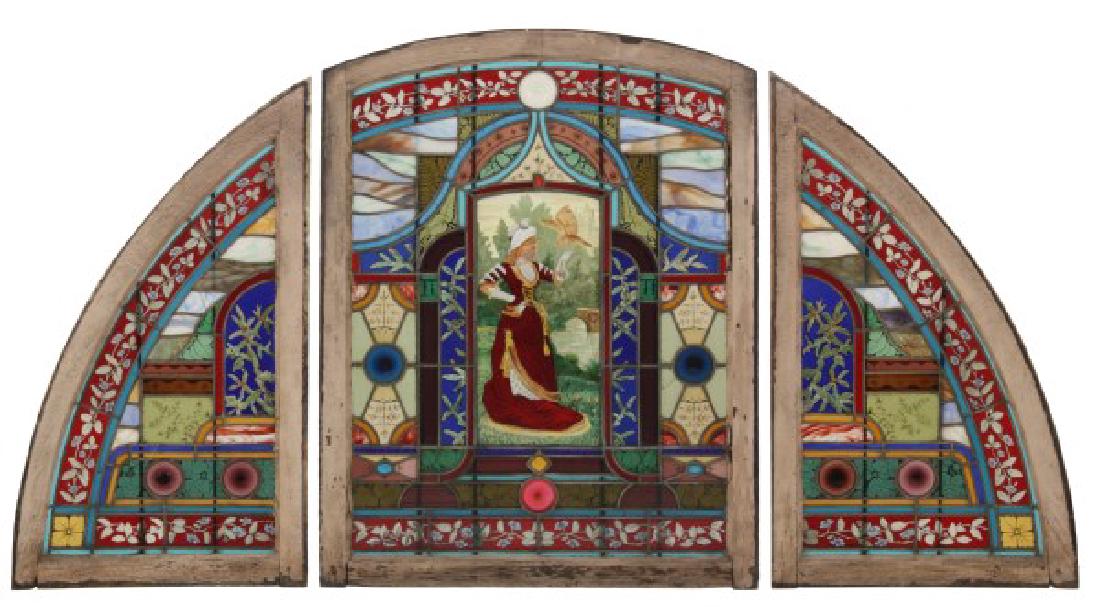 3 Part Leaded & Stained Glass Transom Window: 3 Part Leaded & Stained Glass Transom Window. Large arched center panel with 2 side panels has colorful green, cranberry, purple and amber panels with decorated filigree highlighted borders and blue,