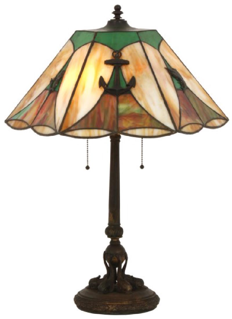Attr. Riviere Studios Nautical Table Lamp: Attr. Riviere Studios Nautical Table Lamp. 16 in. hexagonal shade has large green, caramel and red slag leaded panels mounted in the center with brass sailfish, mermaids and anchors; shade is in good