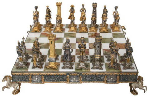 Giuseppe Vasari Napoleonic Chess Set: Giuseppe Vasari (1934-2005, Italy), gilt and silvered metal chess set depicting the 1815 Battle of Waterloo with the French side led by Napoleon Bonaparte and the British allied army under the