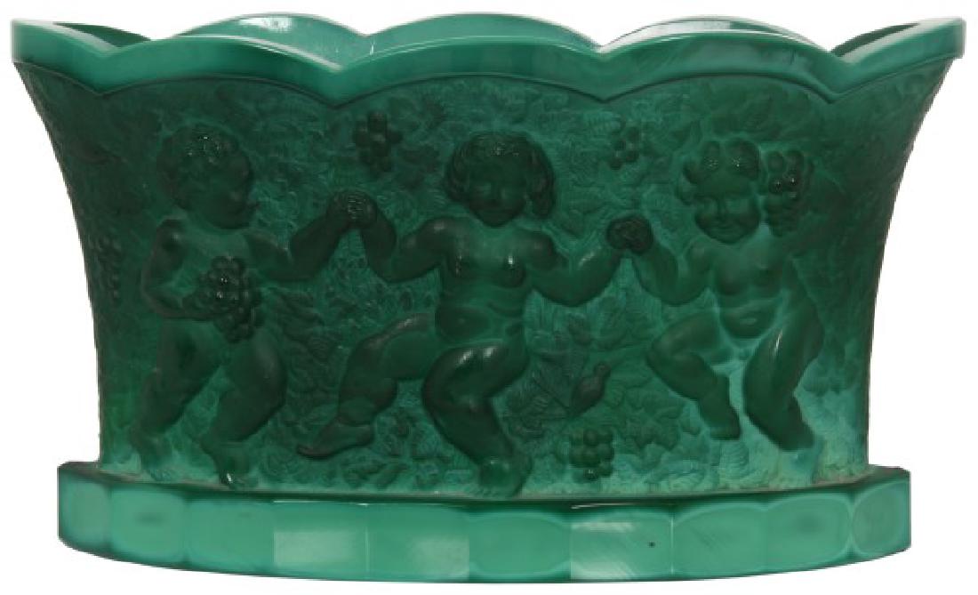 Czech Malachite Glass Fernery: Czech Malachite Glass Fernery. Has an oblong form with scalloped rim and 3 relief decorated figural dancing putti on the front and back with a leafy background. Excellent condition, unsigned. 7.75 in.