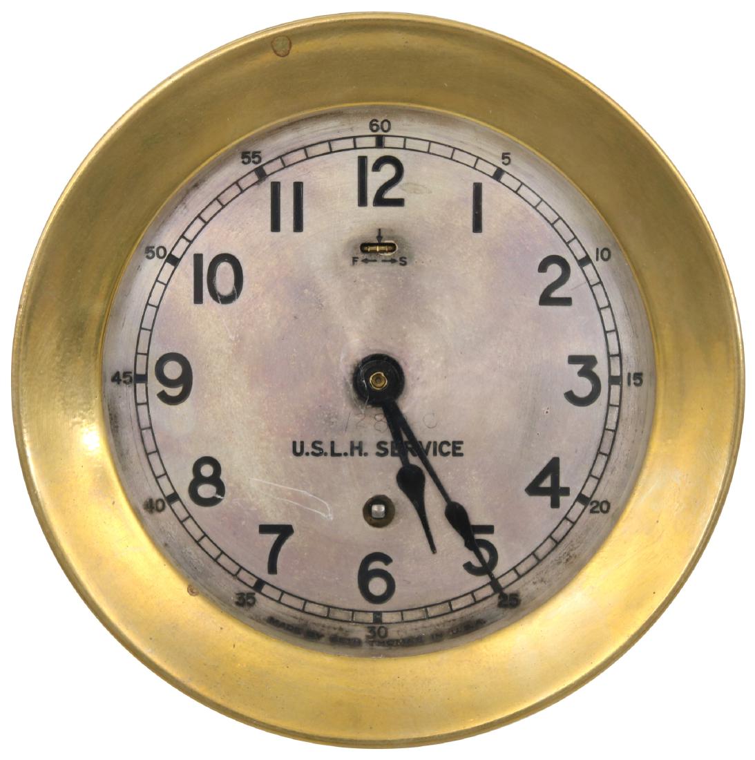 Seth Thomas "Corair No. 6" Lighthouse Clock: Seth Thomas "Corair No. 6" Lighthouse Clock. 6 in. silvered dial signed "Made By Seth Thomas In USA" and "U.S.L.H. Service", has black incised hour numbers, 5 minute numbers, black spade hands and swe
