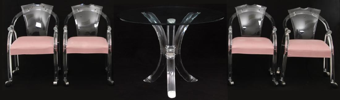 5 Pcs. Charles Hollis Jones Lucite Dining Set: 5 Pcs. Charles Hollis Jones Lucite Dining Set. Charles Hollis Jones design tripod lucite tusk table with 42 in. dia. glass top, measures 29.5 in. high. The 4 armchairs have arched 1.5 in. dia. lucite