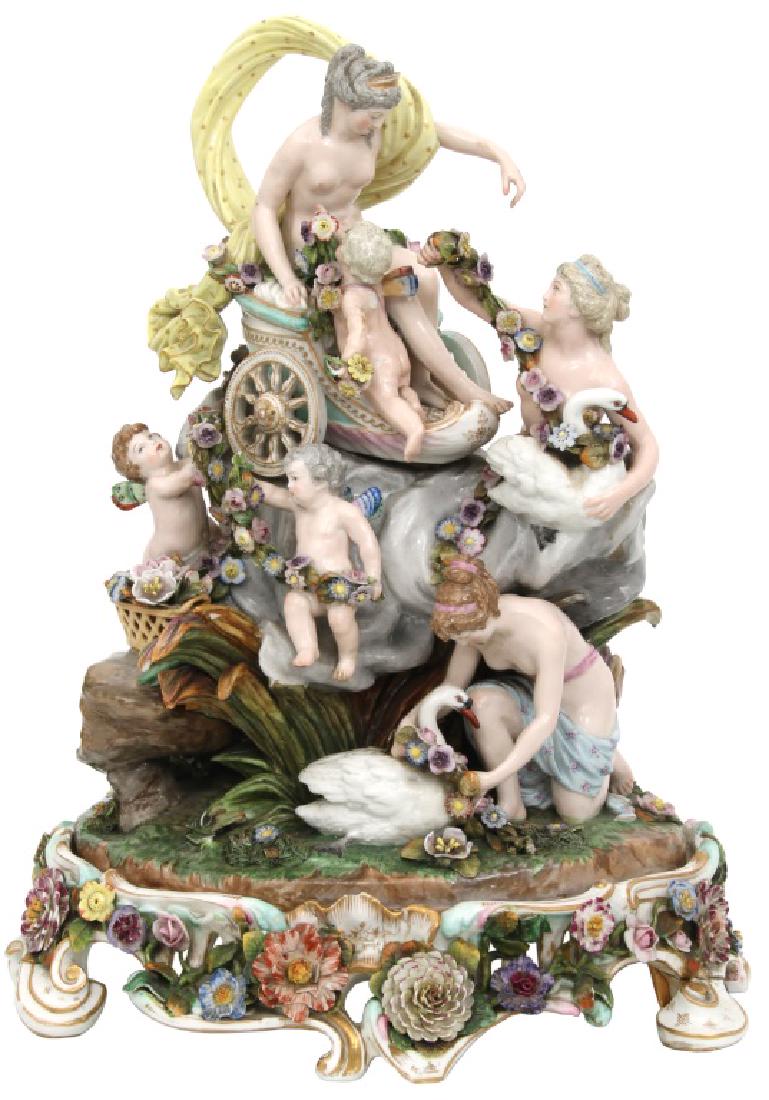Large Meisssen Porcelain Figural Grouping: Large Meisssen Porcelain Figural Grouping. Figure of a nude woman with winged putti in a chariot with 2 maidens with swans to the side and 2 figural winged putti in the front; has flowers and strands 