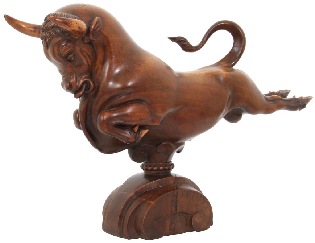 Katharine Hepburns's "Europa and the Bull": Katharine Hepburns's "Europa and the Bull" by R.J. McKnight. Robert Johnson MacKnight (American, 1905-1989) deco carved walnut sculpture titled "Europa and the Bull", a stylish depiction of a bull jum